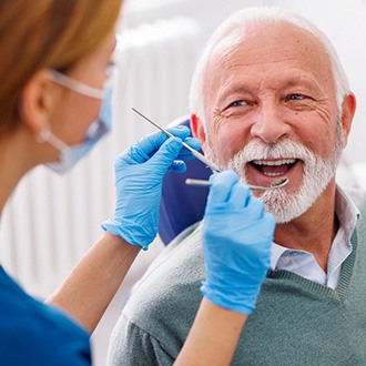 Patient smiles at dentist