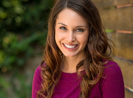 Woman with beautiful smile outdoors