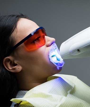 Patient receiving teeth whitening treatment