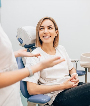 woman talking to her cosmetic dentist in Springfield, NJ