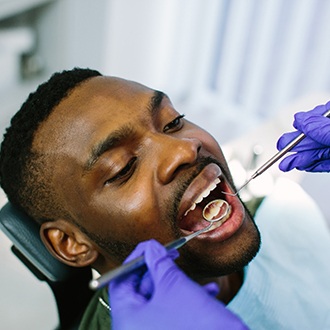 man at dental checkup