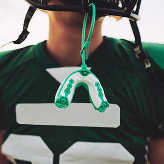 mouthguard attached to football helmet 