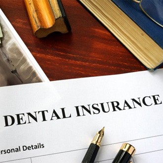 a dental insurance form for the cost of dental implants