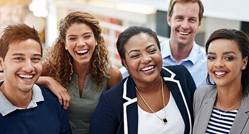 Group of business people laughing together