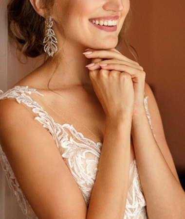 Bride smiling in a wedding dress 