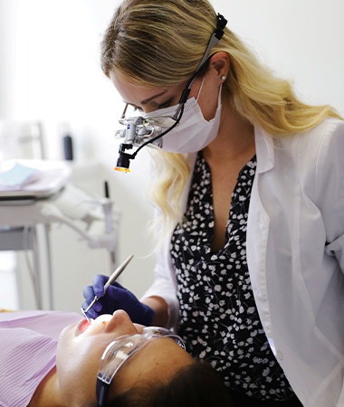 Doctor Henking treating dental patient