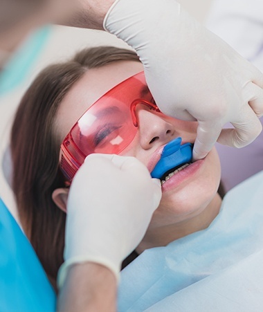 Patient receiving fluoride treatment