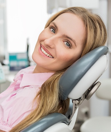 Smiling woman in dental chair