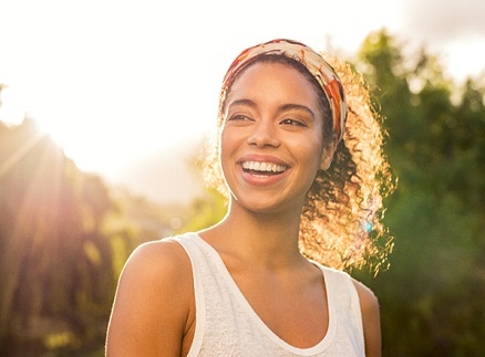 Smiling woman after teeth whitening