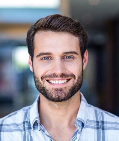 Man smiling after teeth whitening