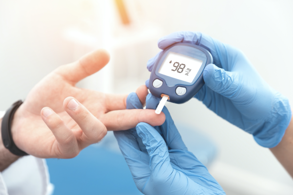 people using a blood glucose meter 