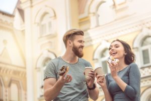 couple eating donuts 