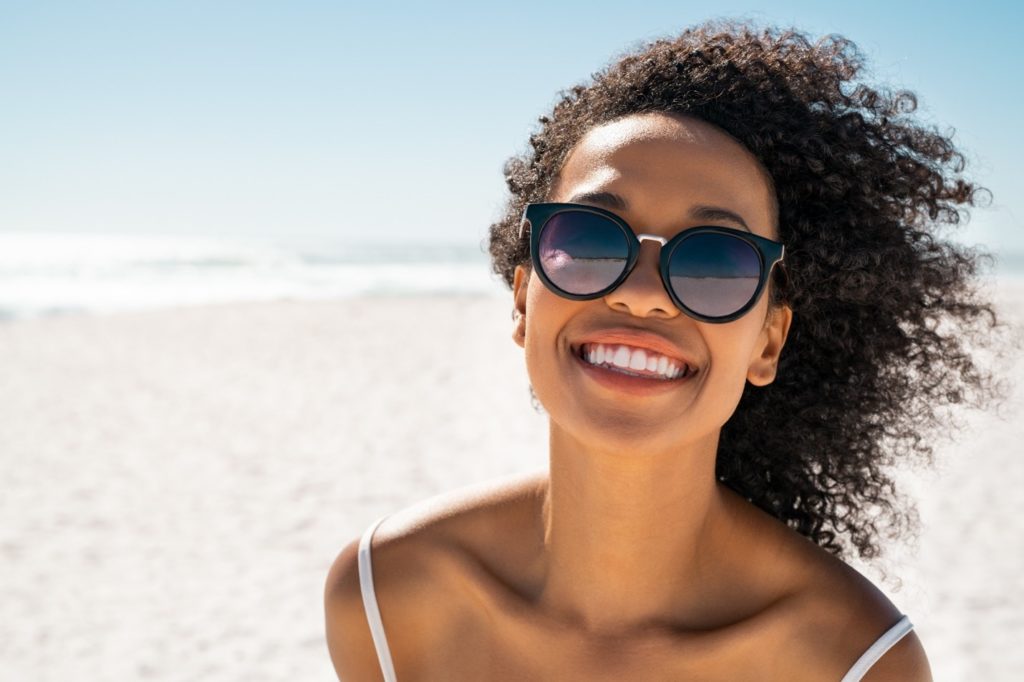 person with dental implants smiling 