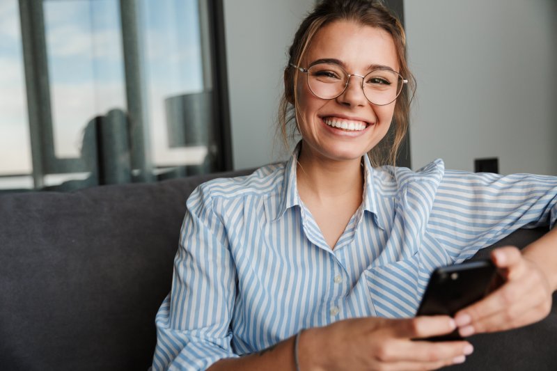 person who had root canal therapy smiling 